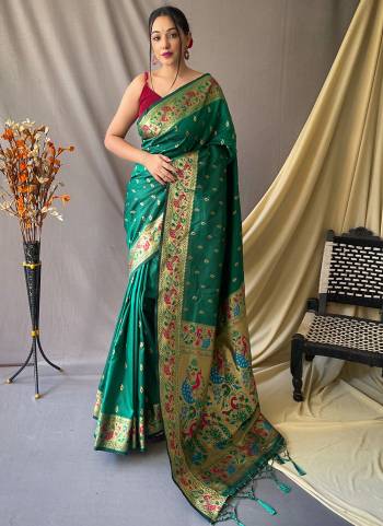 Garb These Party Wear Saree With Blouse in Fine Colored.These Saree And Blouse is Fabricated On Soft Silk.Its Beautified With Paithani Meenakari Jari Wevon Designer.