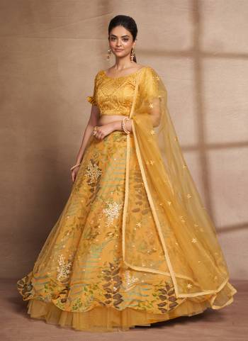 For A Designer Look,Grab These Lehenga Choli in Fine Colored.These Lehenga Are Net And Organza And Dupatta Are Fabricated On Net Pair With Italian Silk Blouse.Its Beautified With Digital Printed With Thread,Sequance Embroidery Work.