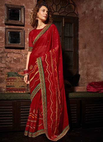 Garb These Designer Saree in Fine Colored.These Saree Are Gold Coin Chiffon And Blouse is Fabricated On Gold Coin Chiffon Pair.Its Beautified Blooming Color,Panel Embroidery,Swarovski Work.