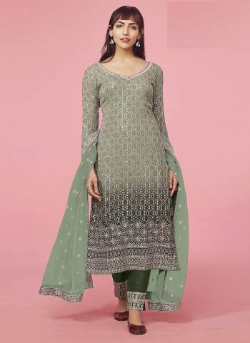 Garb These Designer Suits in Fine Colored Pair With Dupatta.These Top And Dupatta Are Fabricated On Faux Georgette Pair With Santoon Bottom.Its Beautified With Heavy Designer Embroidery Work.