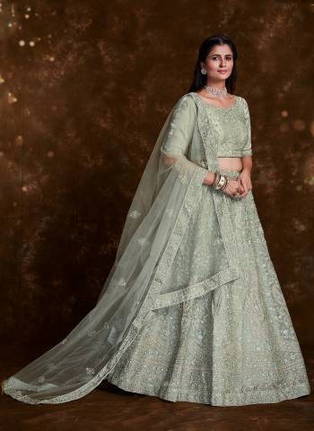 For A Designer Look,Grab These Lehenga Choli in Fine Colored.These Lehenga And Choli Are Fabricated On Organza Pair With Soft Net Dupatta.Its Beautified With Heavy Designer Embroidery,Zarkan Work.