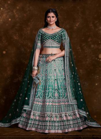 For A Designer Look,Grab These Lehenga Choli in Fine Colored.These Lehenga And Choli Are Fabricated On Art Silk Pair With Soft Net Dupatta.Its Beautified With Heavy Designer Embroidery,Zarkan Work.