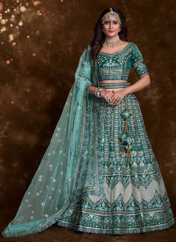 For A Designer Look,Grab These Lehenga Choli in Fine Colored.These Lehenga And Choli Are Fabricated On Art Silk Pair With Soft Net Dupatta.Its Beautified With Heavy Designer Embroidery,Zarkan Work.