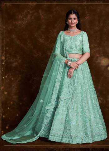 For A Designer Look,Grab These Lehenga Choli in Fine Colored.These Lehenga And Choli Are Fabricated On Organza Pair With Soft Net Dupatta.Its Beautified With Heavy Designer Embroidery,Zarkan Work.