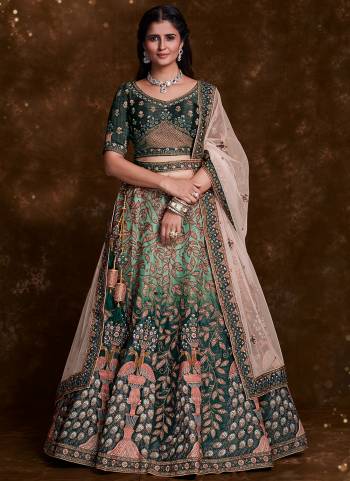 For A Designer Look,Grab These Lehenga Choli in Fine Colored.These Lehenga And Choli Are Fabricated On Art Silk Pair With Soft Net Dupatta.Its Beautified With Heavy Designer Embroidery,Zarkan Work.