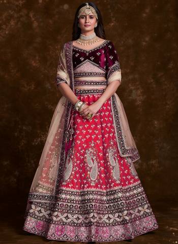 For A Designer Look,Grab These Lehenga Choli in Fine Colored.These Lehenga Are Art Silk And Choli Are Fabricated On Velvet Pair With Soft Net Dupatta.Its Beautified With Heavy Designer Embroidery,Zarkan Work.