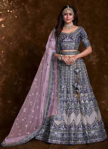 For A Designer Look,Grab These Lehenga Choli in Fine Colored.These Lehenga And Choli Are Fabricated On Art Silk Pair With Soft Net Dupatta.Its Beautified With Heavy Designer Embroidery,Zarkan Work.