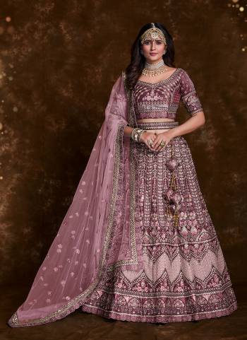 For A Designer Look,Grab These Lehenga Choli in Fine Colored.These Lehenga And Choli Are Fabricated On Art Silk Pair With Soft Net Dupatta.Its Beautified With Heavy Designer Embroidery,Zarkan Work.