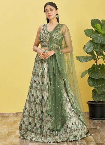 For A Designer Look,Grab These Lehenga Choli in Fine Colored.These Lehenga Are Chinon And Blouse Are Fabricated On Slub Silk Pair With Organza Soft Net.Its Beautified With Designer Printed With Real Mirror,Thread,Jari,Sequance Embroidery Work.