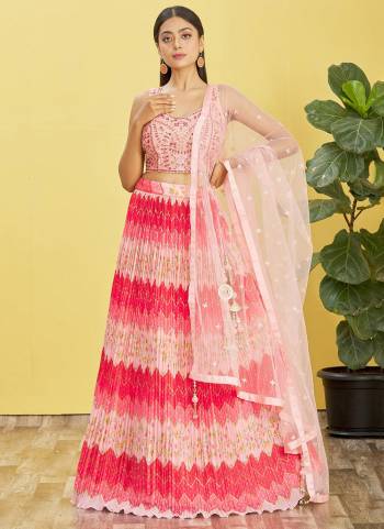 For A Designer Look,Grab These Lehenga Choli in Fine Colored.These Lehenga Are Chinon And Blouse Are Fabricated On Slub Silk Pair With Organza Soft Net.Its Beautified With Designer Printed With Real Mirror,Thread,Jari,Sequance Embroidery Work.