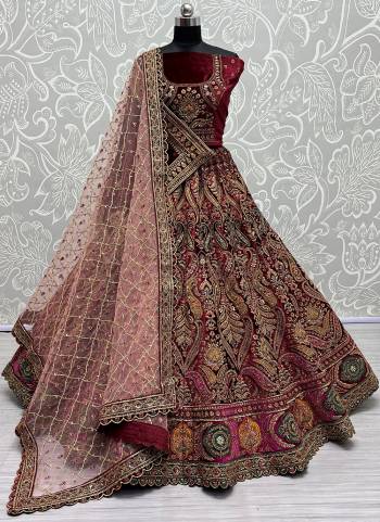 For A Fancy Designer Look,Grab These Lehenga Choli With 2 Dupatta in Fine Colored.These Lehenga And Choli Are Velvet And Dupatta Are Fabricated On Soft Net & Velvet Pair.Its Beautified With Designer Fancy Multy Thread,Sequance,Dori Embroidery,Diamond Work.