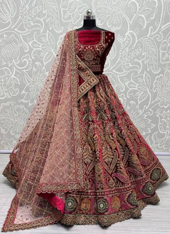 For A Fancy Designer Look,Grab These Lehenga Choli With 2 Dupatta in Fine Colored.These Lehenga And Choli Are Velvet And Dupatta Are Fabricated On Soft Net & Velvet Pair.Its Beautified With Designer Fancy Multy Thread,Sequance,Dori Embroidery,Diamond Work.