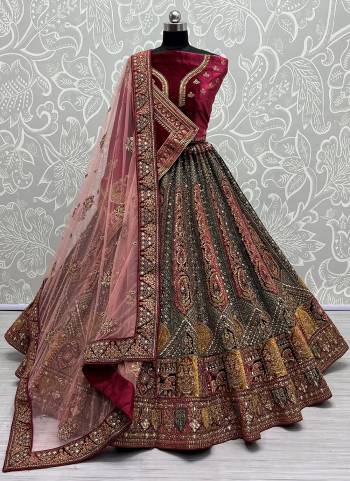 For A Fancy Designer Look,Grab These Lehenga Choli With 2 Dupatta in Fine Colored.These Lehenga And Choli Are Velvet And Dupatta Are Fabricated On Soft Net & Velvet Pair.Its Beautified With Designer Patch,Hand Mirroe,Jari,Dori Embroidery,Zarkan Diamond Work.