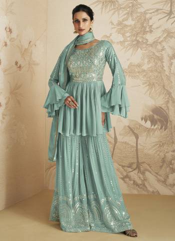 Garb These Designer Suits in Fine Colored Pair With Dupatta.These Top And Dupatta Are Fabricated On Chinon Pair With Chinon Bottom.Its Beautified With Heavy Designer Sequance Embroidery Work.