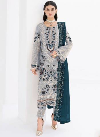 Attrective These Designer Suit in Fine Colored Pair With Bottom And Dupatta.These Top And Dupatta Are Fabricated On Faux Georgette Pair With Santoon Bottom.Its Beautified With Santoon Inner.Its Beautified With Heavy Designer Embroidery Work.