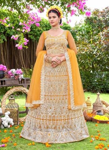 Grab These Beautiful Colored Lehenga Choli.These Lehenga and Dupatta Are Fabricated On Net Pair With Net Blouse.Its Beautified With Heavy Embroidery Work.