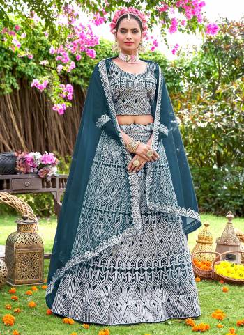 Grab These Beautiful Colored Lehenga Choli.These Lehenga and Dupatta Are Fabricated On Net Pair With Net Blouse.Its Beautified With Heavy Embroidery Work.