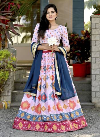 For A Designer Look,Grab These Lehenga Choli in Fine Colored.These Lehenga And Blouse Are Fabricated On Chinon Pair With Faux Georgette Dupatta.Its Beautified With Designer Printed,Sequance Embroidery Work.