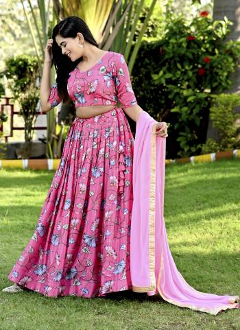 For A Designer Look,Grab These Lehenga Choli in Fine Colored.These Lehenga And Blouse Are Fabricated On Chinon Pair With Faux Georgette Dupatta.Its Beautified With Designer Printed,Sequance Embroidery Work.