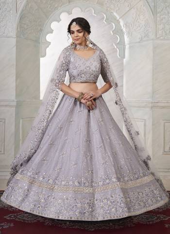 A Designer Look,Grab These Lehenga Choli in Fine Colored.These Lehenga And Blouse Are Fabricated On Art Silk Pair With Net Dupatta.Its Beautified With Thread,Sequance Embroidery,Stone Work.