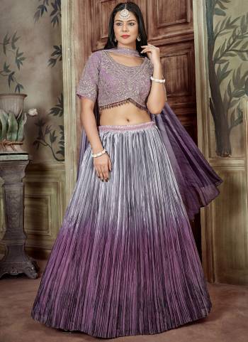 A Designer Look,Grab These Lehenga Choli in Fine Colored.These Lehenga Are Synthetic And Blouse Are Fabricated On Net Pair With Synthetic Dupatta.Its Beautified With Designer Embroidery Work.