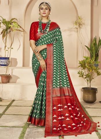 Garb These Party Wear Saree in Fine Colored.These Saree And Blouse is Fabricated On Cotton Silk Pair.Its Beautified With Weavon Designer With Chevron Printed.