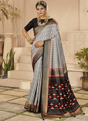 Garb These Party Wear Saree in Fine Colored.These Saree And Blouse is Fabricated On Cotton Silk Pair.Its Beautified With Weavon Designer With Chevron Printed.