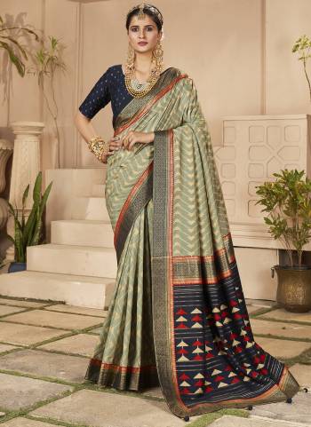 Garb These Party Wear Saree in Fine Colored.These Saree And Blouse is Fabricated On Cotton Silk Pair.Its Beautified With Weavon Designer With Chevron Printed.