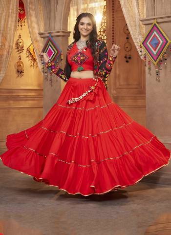 Attrective These Navratri Special Lehenga Choli With Koti in Fine Colored.These Lehenga And Blouse Are Viscose Rayon And Koti Are Fabricated On Viscose Rayon.Its Beautified With Heavy Mirror,Thread Embroidery Work.