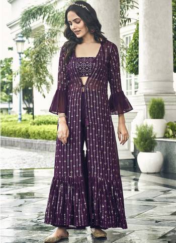 Garb This Partywear Plazzo Blouse With Jacket Are Fine Colored.These Designer Blouse Plazzo And Jacket Fabric Are Faux Georgette In Fabricated Beautified With Attrective Thread,Sequance Embroidery Work. Buy Now.