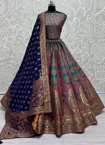 For A Fancy Designer Look,Grab These Lehenga Choli With Dupatta in Fine Colored.These Lehenga And Choli Are Banarasi Silk And Dupatta Are Fabricated On Viscose Silk Pair.Its Beautified With Wevon Designer, Embroidery,Zarkan Diamond Work.