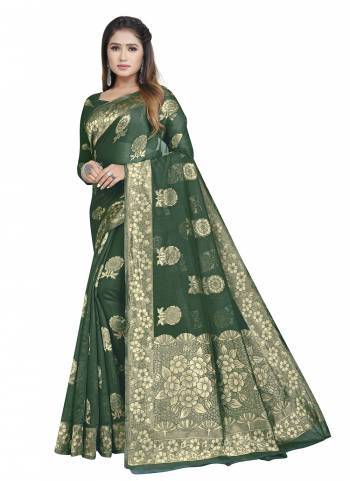 Grab These Festive Wear Saree in Fine Dark Colored.These Saree is Fabricated On Chanderi Cotton Pair With Chanderi Cotton Blouse.Its Beautified With Wevon Designer.