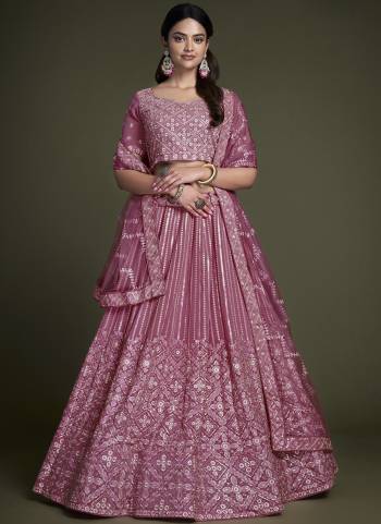 For A Designer Look,Grab These Lehenga Choli in Fine Colored.These Lehenga And Choli Are Fabricated On Georgette Pair With Soft Net Dupatta.Its Beautified With Heavy Designer Sequance,Thread Embroidery Work.