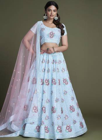 For A Designer Look,Grab These Lehenga Choli in Fine Colored.These Lehenga And Choli Are Fabricated On Georgette Pair With Soft Net Dupatta.Its Beautified With Heavy Designer Sequance,Thread Embroidery Work.