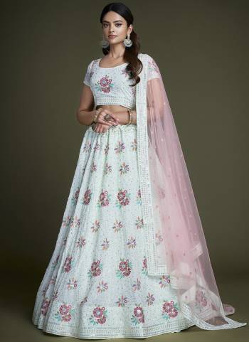 For A Designer Look,Grab These Lehenga Choli in Fine Colored.These Lehenga And Choli Are Fabricated On Georgette Pair With Soft Net Dupatta.Its Beautified With Heavy Designer Sequance,Thread Embroidery Work.