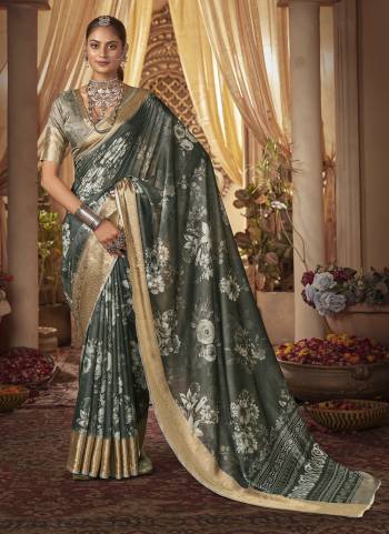 Attrective Looking These Party Wear Saree in Fine Colored.These Saree Are Cotton Silk And Blouse is Fabricated On Cotton Silk Pair.Its Beautified With Weavon Jari Border Designer With Digital Floral Printed.