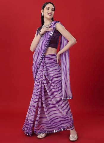 Garb These Party Wear Saree in Fine Colored.These Saree Are Georgette And Blouse is Art Silk Fabricated.Its Beautified With Designer Sabori Printed,Mirror Lace Border.