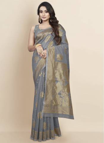 Grab These Festive Wear Saree in Fine Dark Colored.These Saree is Fabricated On Chanderi Cotton Pair With Chanderi Cotton Blouse.Its Beautified With Wevon Designer.