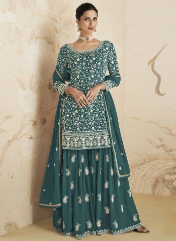 Garb These Designer Plazzo Suits in Fine Colored Pair With Dupatta.These Top And Dupatta Are Fabricated On Faux Georgette Pair With Faux Georgette Bottom.Its Beautified With Heavy Designer  Embroidery Work.