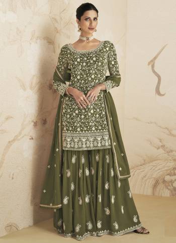 Garb These Designer Plazzo Suits in Fine Colored Pair With Dupatta.These Top And Dupatta Are Fabricated On Faux Georgette Pair With Faux Georgette Bottom.Its Beautified With Heavy Designer  Embroidery Work.