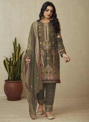 Attrective Looking These Suit in Fine Colored Pair With Bottom And Dupatta.These Top And Dupatta Are Fabricated On Organza Pair With Silk Bottom.Its Beautified With Designer Embroidery Work.