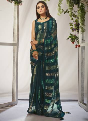 Garb These Fancy Party Wear Saree in Fine Colored.These Saree Are Georgette And Blouse is Mono Banglori Fabricated.Its Beautified With Designer Sequance Embroidery Work.