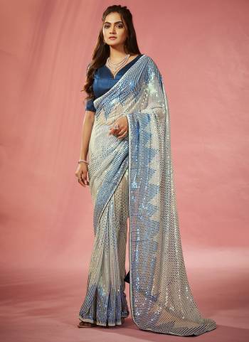 Garb These Fancy Party Wear Saree in Fine Colored.These Saree Are Georgette And Blouse is Mono Banglori Fabricated.Its Beautified With Designer Sequance Embroidery Work.