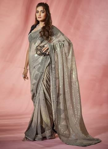 Garb These Fancy Party Wear Saree in Fine Colored.These Saree Are Georgette And Blouse is Mono Banglori Fabricated.Its Beautified With Designer Sequance Embroidery Work.