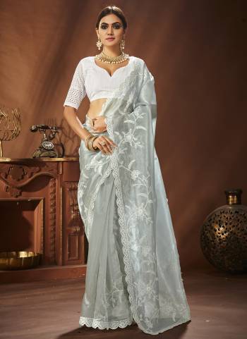 Attrective These Fancy Party Wear Saree in Fine Colored.These Saree Are Khadi Organza And Blouse is Art Silk Fabricated.Its Beautified With Designer Thread Embroidery,Hand Work.