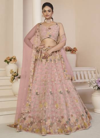 For A Fancy Designer Look,Grab These Lehenga Choli With Dupatta in Fine Colored.These Lehenga And Choli Are Net And Dupatta Are Fabricated On Net Pair.Its Beautified With Designer Sequance Embroidery Work.