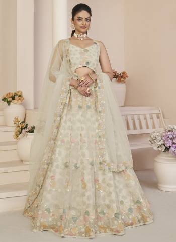 For A Fancy Designer Look,Grab These Lehenga Choli With Dupatta in Fine Colored.These Lehenga And Choli Are Net And Dupatta Are Fabricated On Net Pair.Its Beautified With Designer Sequance Embroidery Work.