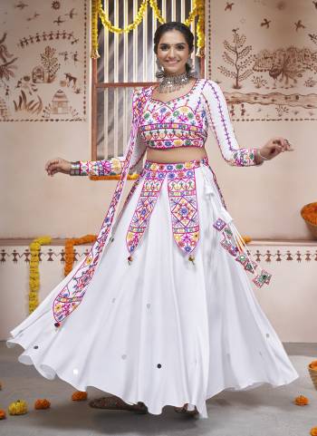 Attrective These Navratri Special Lehenga Choli in Fine Colored.These Lehenga And Blouse Are Viscose Rayon And Dupatta Are Fabricated On Viscose Rayon.Its Beautified With Designer Embroidery Work.