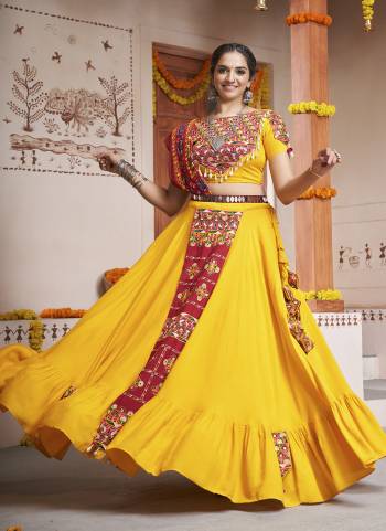 Attrective These Navratri Special Lehenga Choli in Fine Colored.These Lehenga And Blouse Are Viscose Rayon And Dupatta Are Fabricated On Cotton.Its Beautified With Designer Embroidery Work.