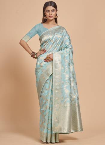 Garb This Partywear Saree Paired With Blouse In Fine Color.This Saree And Blouse Are Organza Based Fabric With Weaving Jacquard Designer. Buy This Pretty Saree Now.